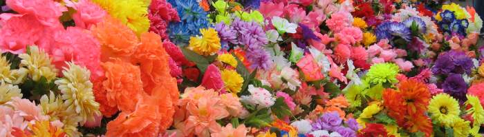 Colorful silk flowers in an outdoor bazaar in Ukraine