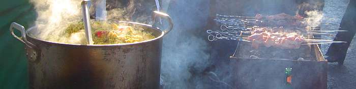 Shashlik cooking on the grill at a Mazlonitza Festival in Kiev, Ukraine